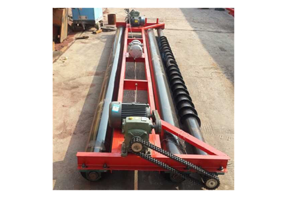 concrete road paver machine showing the first auger blade roller laying machine