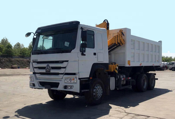 Howo dump truck with folded crane 5ton tipper truck with knuckle boom crane