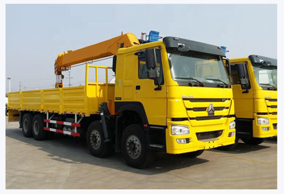 Sinotruk Howo 8x4 Euro 2 cargo truck mounted 20ton telescopic boom crane