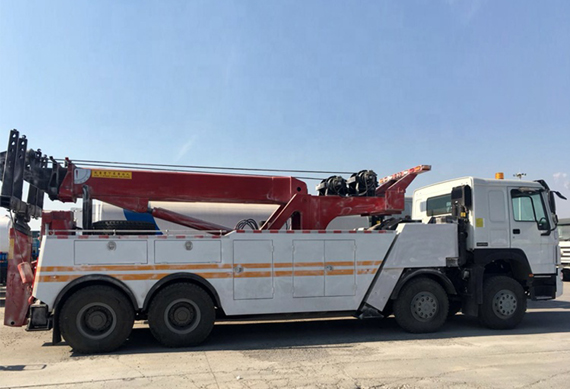 Sinotruk Howo 8x4 rotator flat bed recovery tow truck for sale